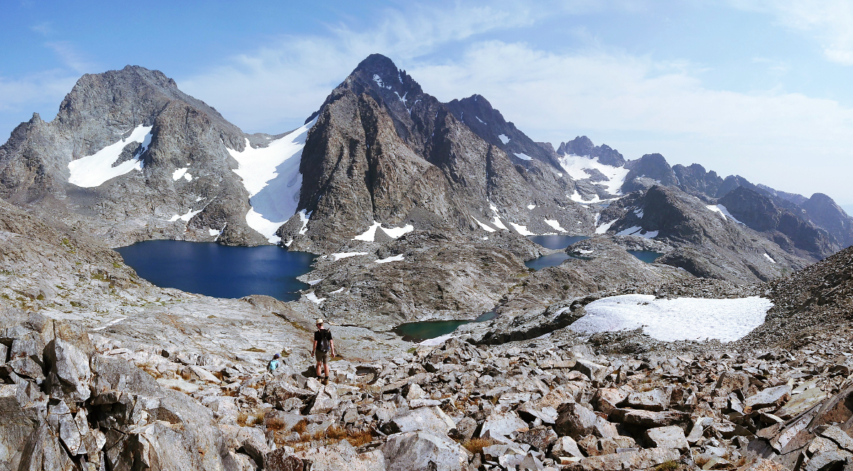 Lake Catherine being extremely blue, and the less dignified backsides of Banner (left) and Ritter (right).