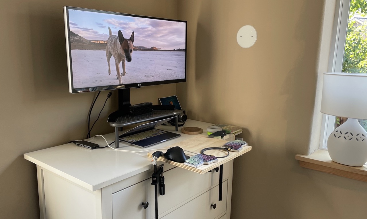 Gradient keyboard finally at home on my makeshift standing desk.