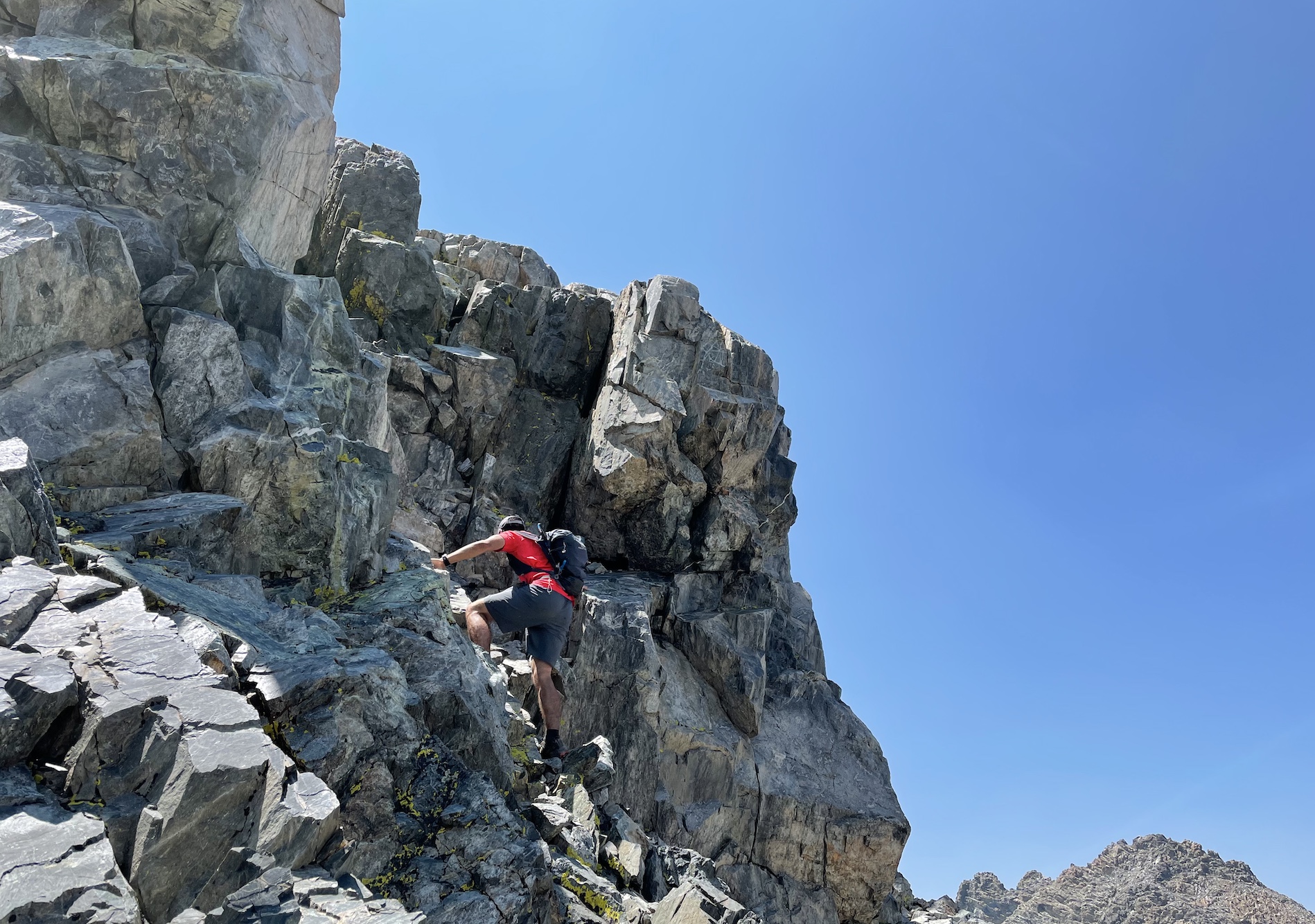 Rafee scrambling up to the class 3 ridge.